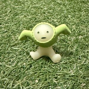 SMISKI Authentic Blindbox Glow-In-The-Dark Figure with Sweater Over Arms